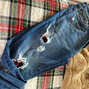 Judy blue jeans with buffalo check patches.